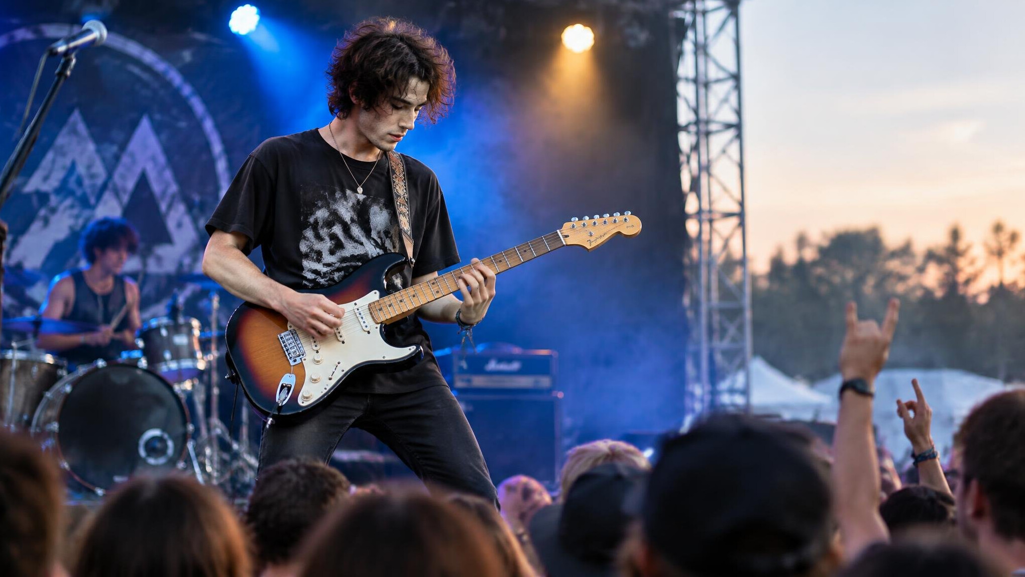 young musician performing on stage